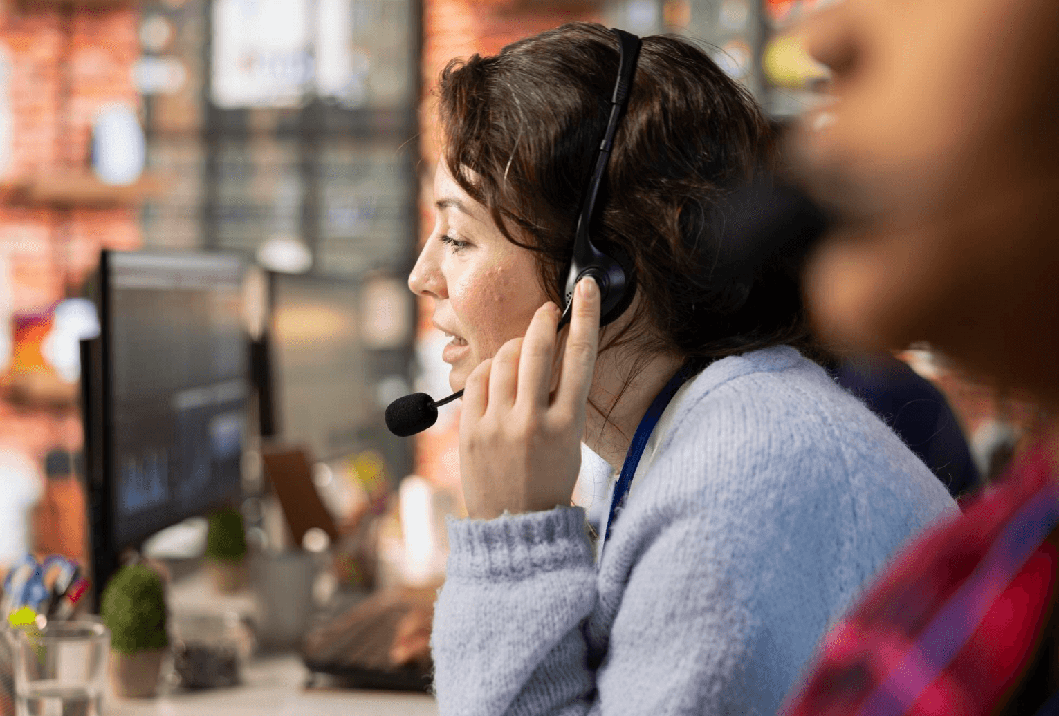 Support team assisting a hotel guest